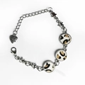 Detail of bohemian leopard print leather bracelet with star charms and heart tag - Leopard Print