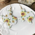 Boho Texas map earrings with yellow sunflower pattern and white glitter finish - Texas Map Sunflower-White Glitter (1)