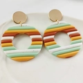 Artistic handmade polymer clay hoop earrings with vibrant colorful rainbow stripes - Black Speckled Green Orange Striped Style
