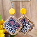 Close-up of bohemian square earrings with leopard print and yellow woven texture detail - Bright Yellow Patchwork Leopard (2)