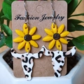 Detail of sunflower and leopard print cow skull earrings on a fashion display card - Sunflower Leopard Pattern Bull Head Style (4)
