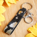Handmade leather keychain with black silver foil calf hair and large silver keyring - Splatter Pattern Style