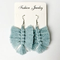 Handmade bohemian light blue fringe leaf earrings with silver hooks on display card - Light Blue Gray