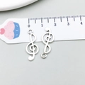 Vista de cerca de dijes de clave de sol en plata antigua de 2,5 cm para joyería DIY - Clave de Sol (5619) / 1 Pieza (10x25mm) / Plata antigua