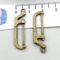 Antique bronze hand saw alloy pendant with hanging loop and fine tooth details - Saw (17389)