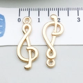 Pendentifs notes de musique dorés en alliage, hauteur 2,5 cm avec règle de mesure - Symbole de Musique (20931) / 1 Pièce (10x27mm) / Or KC