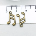 Coppia di ciondoli a forma di nota musicale in bronzo antico finitura metallo - Simbolo Nota Musicale (20907)