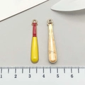 Detailed view of 3.5cm baseball bat enamel charms for DIY necklaces with scale reference - Enamel Baseball Bat Style (19634) / Yellow