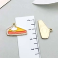 Detailed scale view of a 2.5cm yellow cake slice charm with colorful enamel and gold back - Thanksgiving Cake (19196) / 1 Piece Pack (14x20mm) / Yellow