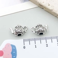 Vintage silver tea time pendants with floral relief and retro antique finish - Antique Silver Teapot