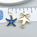 Vue détaillée d'un pendentif étoile de mer bleue de 20 mm avec bords dorés pour bijoux - Style Étoile de Mer en Émail Bleu Foncé (8610)