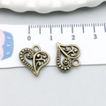 Ciondolo a cuore in bronzo antico traforato con motivi per creazione gioielli DIY - Cuore Traforato (19943)