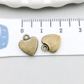 Ciondolo a cuore in lega bronzo antico con anello integrato per creazione di gioielli - Cuore di Pesca (19945)