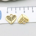 Herzförmiger Flügelanhänger in Antikgold für DIY-Schmuck mit Zentimetermaßstab - Antikgold Federherz (19999)