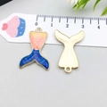 Detailed view of colorful mermaid tail pendants with size scale and gold alloy finish - Mermaid Tail / Blue