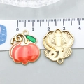 Red enamel pumpkin charm in gold alloy with green leaf detail and back metal texture - Orange Enamel Pumpkin (20291)