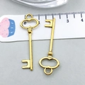 Set of two vintage style golden alloy hollow heart key pendants with measurement scale - Antique Gold Key (20945)