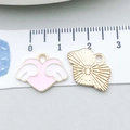 Pink heart with wings and golden fan charms with measuring tape for size scale - Pink Enamel Heart Wing (14971) / 17x13mm