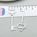 Pendentifs clé cœur creux en alliage argenté pour la fabrication de bijoux DIY - Clé Tête Fantaisie Argent Brillant / 14*40mm (20975)