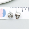 Macro view of antique silver alloy floral bail charms for DIY jewelry making - Antique Silver Bail 8x10mm (8280)