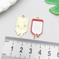 Blood bag medical pendant in enamel finish for DIY jewelry and bracelets making - Red White Enamel IV Bag 28*14mm (18898)