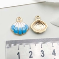 Blue and white striped seashell charm pendant with ruler for scale reference - Shell / Lake Blue