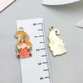 Enamel Thanksgiving gnome pendant with orange hat and pumpkin for DIY jewelry making - Gnome Holding Pumpkin (19213)