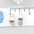 Macro shot of antique silver alloy spiral bead pendant with connector ring and scale - Bright Silver Spiral Thread (20674)