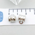 Close-up of antique silver alloy bail beads with engraved wave patterns for DIY jewelry - Bright Silver Wave Relief (20676)