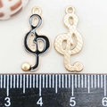 Macro shot of treble clef music charms in black enamel and gold finish with dimensions - Black Enamel Music Symbol (21*9mm)