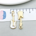 White enamel electric guitar metal charm with gold finish and top loop for DIY jewelry - Guitar Shape
