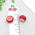 Macro detail of 14mm red faceted large hole bead with silver metal core for DIY bracelets - Round Faceted Large Hole Bead (13246) / 1 Piece (13x13mm) / Red
