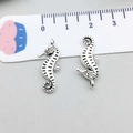 Silver vintage alloy seahorse charms with antique finish and top hanging loops - Antique Silver Seahorse Style (10377) / 22*7mm
