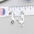 Silver seahorse alloy pendants for jewelry making shown with metric scale reference - Antique Silver Seahorse Style (11309) / 15*30mm