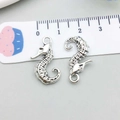 Set of two silver alloy seahorse charms with intricate scale textures and scale measurement - Antique Silver Seahorse Style (16312) / 15*22mm