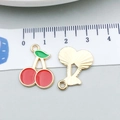 Red cherry enamel alloy pendant charms for DIY jewelry making shown with ruler - Cherry (21353)