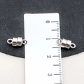Detailed macro view showing a 10mm silver magnetic jewelry clasp with scale comparison - Silver Cylindrical Style (19847) / 11*5mm