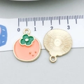 Enamel persimmon fruit pendant in orange and green finish with golden metallic base - Persimmon (21366)