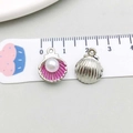 Detailed macro view showing front and back of pink shell charm with pearl and silver texture - Pink (14358)