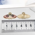 Detail of colorful butterfly enamel pendant with gold back and ruler showing 4cm width - Brown Butterfly (18693)