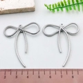 Silver bow alloy pendant with spiral rope texture for DIY necklaces and bracelets - Hemp Rope Bowknot (21397)