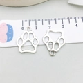 Detailed scale view of a silver alloy paw pendant showing 1.7cm width dimensions - Antique Silver Paw 17x20mm (7113)