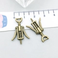 Detailed view of antique bronze wine opener charms with a ruler showing the 3.5cm size - Antique Bronze Opener (20768) / 17*26mm