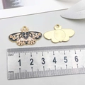 Pink and black enamel butterfly pendant in gold alloy for DIY jewelry, 45mm x 25mm size - Black Green Enamel Pink Rose Butterfly (18777)