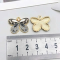 Colorful butterfly alloy pendant charm with purple oil drip and golden honeycomb back - Black Enamel Flower Butterfly (19024)