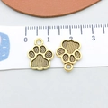 Ciondoli a forma di zampa in lega oro antico per bracciali e collane fai da te, 2 pezzi - Striped Dog Paw (20604)