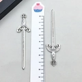 Detail of vintage silver sword pendant with Gladiator engraving and scale reference - 23x83mm / Antique Silver (8076)