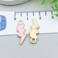 Detailed front and back view of a 2.5cm colorful lightning bolt pendant with gold edges - Pink (12441)