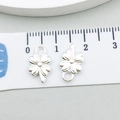 Silver four-leaf clover alloy charm with detailed floral texture for DIY jewelry - Four-Leaf Clover (20447)