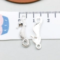 Silver alloy seahorse charms for DIY jewelry with detailed scale texture and top loop - Bright Silver Seahorse (20700)
